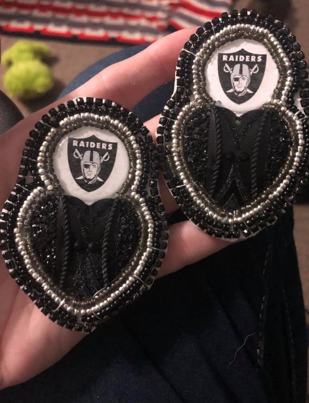 Beaded football earrings